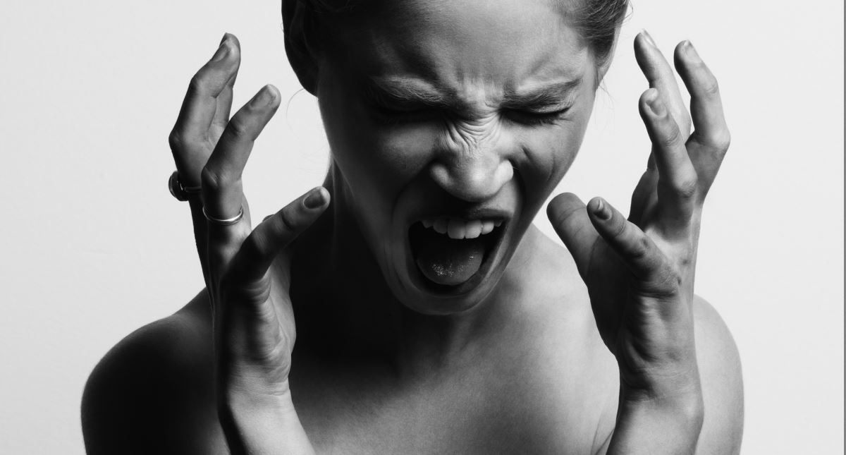 A photo of screaming woman